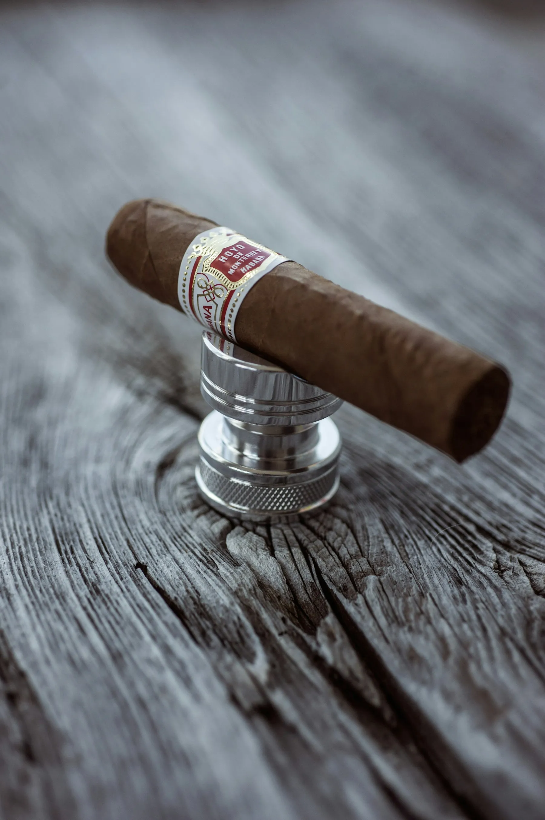 Loose cured tobacco on a wooden work table